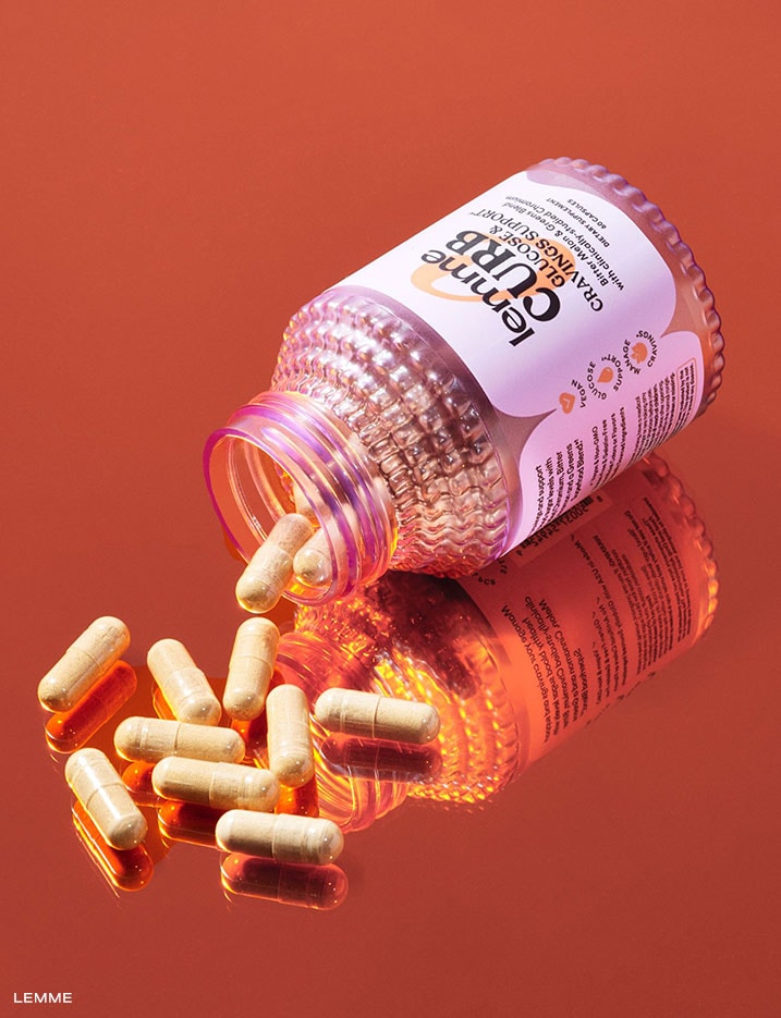 A bottle of Lemme brand Curb glucose & cravings wellness supplements.