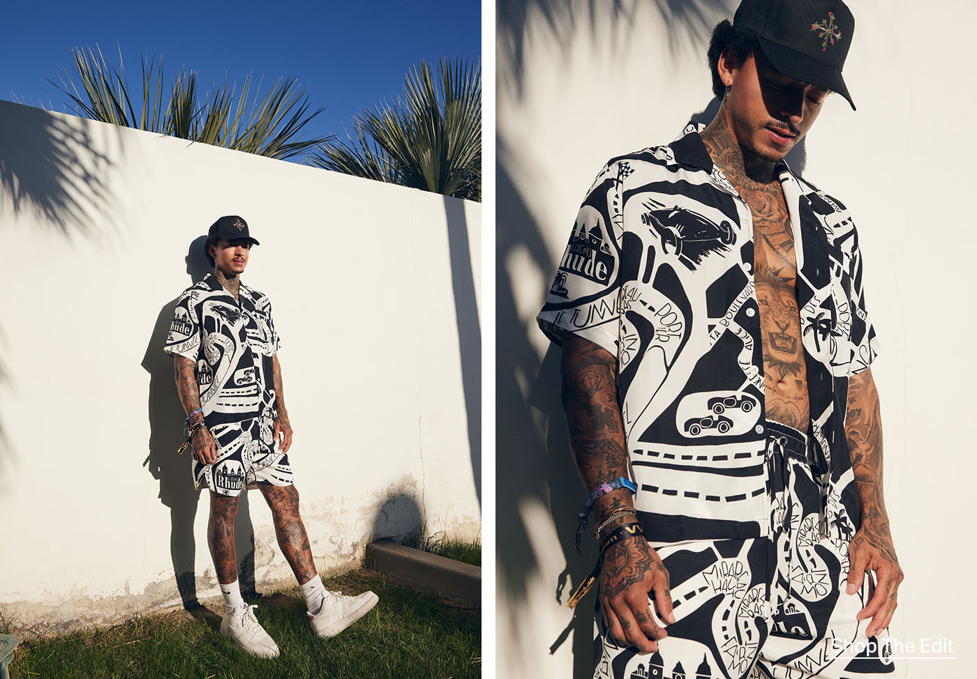 Nyjah posing near a concrete wall wearing black and white silk shirt and shorts.