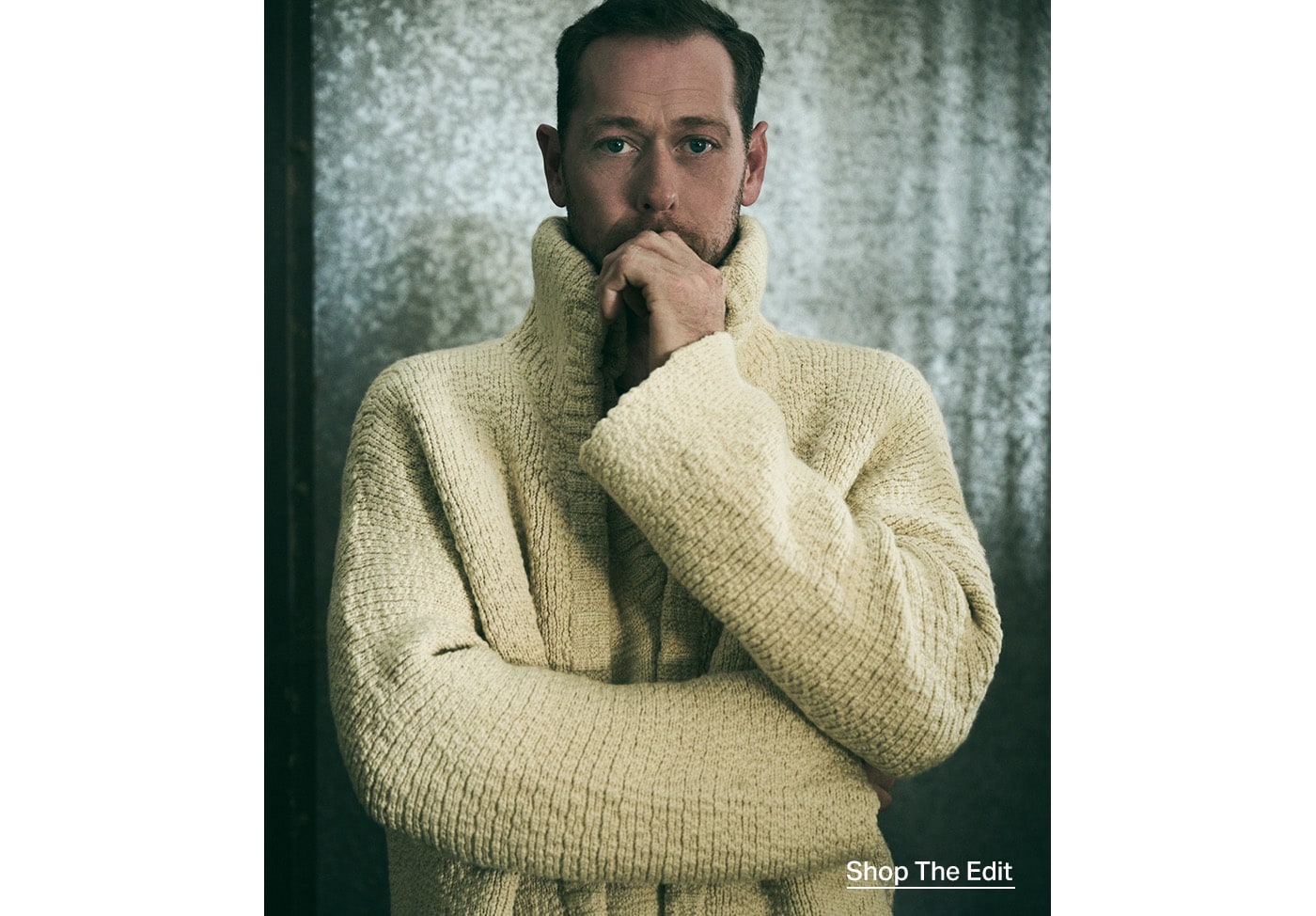 Nick Turner in a yellow wool cardigan.