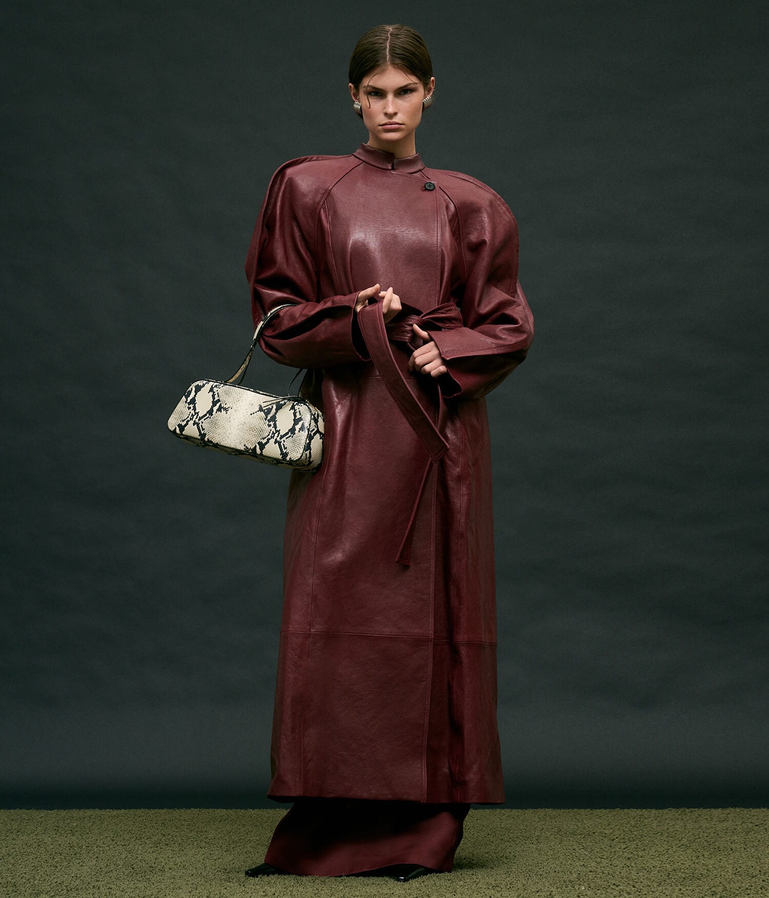 Wrap it Up. A timeless coat completes the season’s look. This merlot trench from Khaite is an investment in elegance that lasts forever. Shop Now 