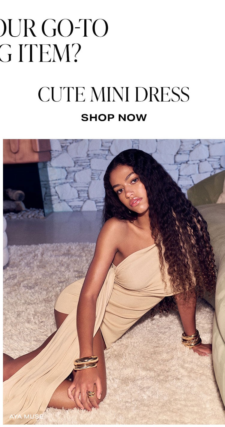 What's Your Go-To Packing Item? Cute Mini Dress. Shop Now.