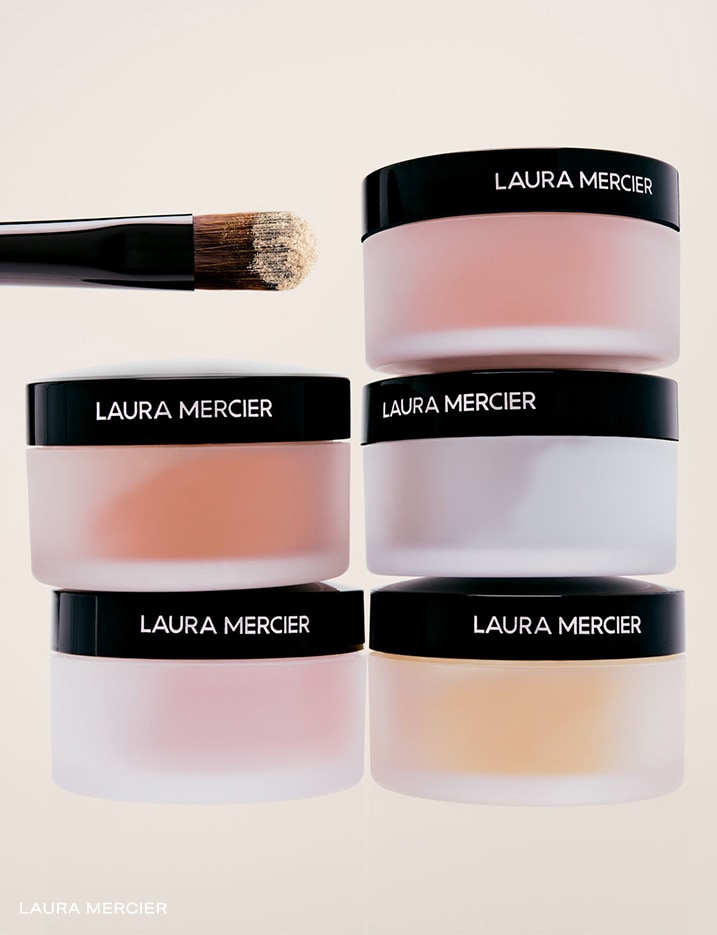 Stacks of Laura Mercier Secret Brightening Powder For Under Eyes.