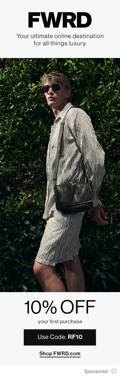 Model in a matching set holding a black bag.