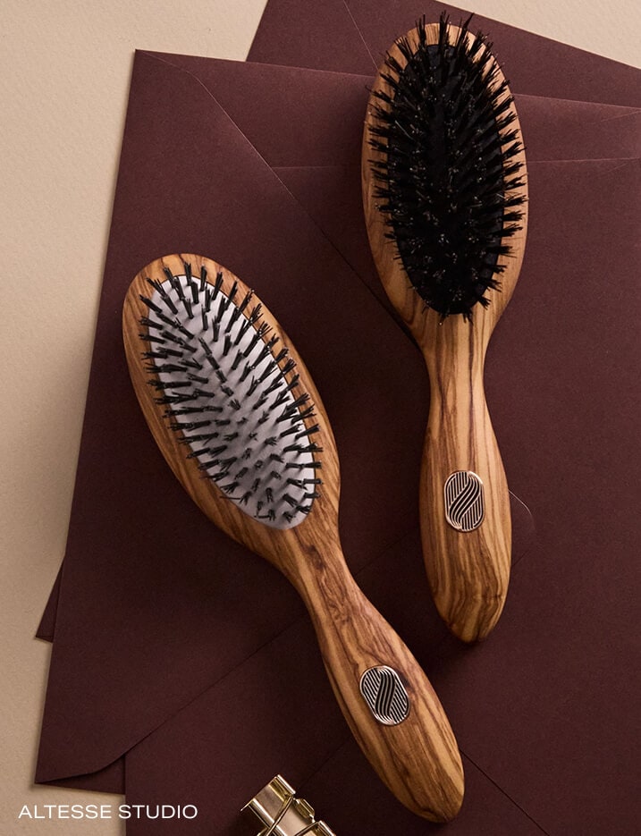 Two hair brushes by Altesse Studio.