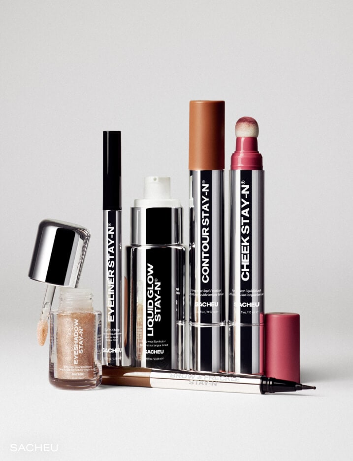 Green bottles of Base-K brand hair products.