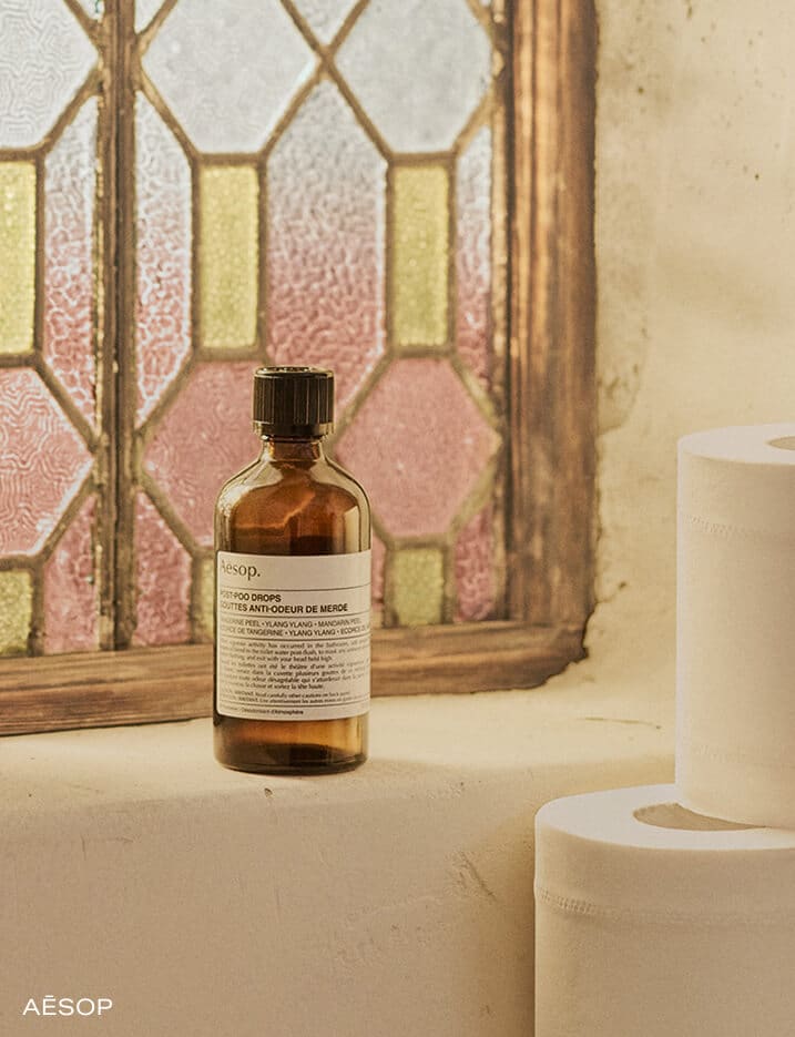 A bottle of Aēsop Post-Poo Drops.
