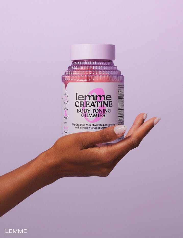 Model hand holding a container of lemme CREATINE Body Toning Gummies.