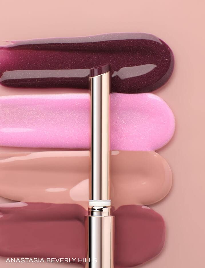 A variety of Anastasia Beverly HIlls Kiss Theory Lip Balms.