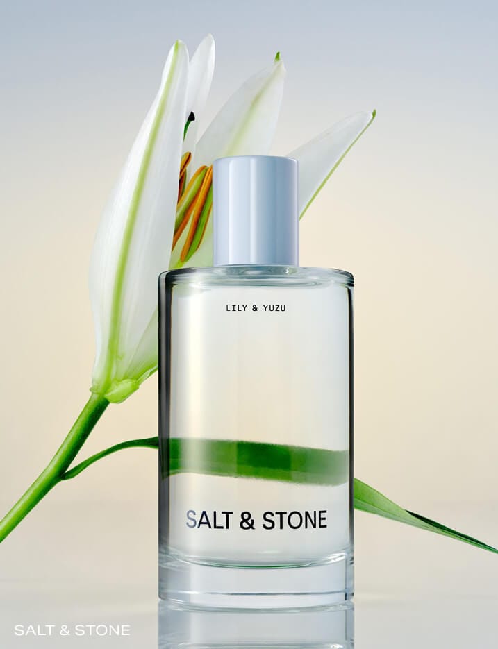 A bottle of Salt & Stone fragrance Lily & Yuzu.