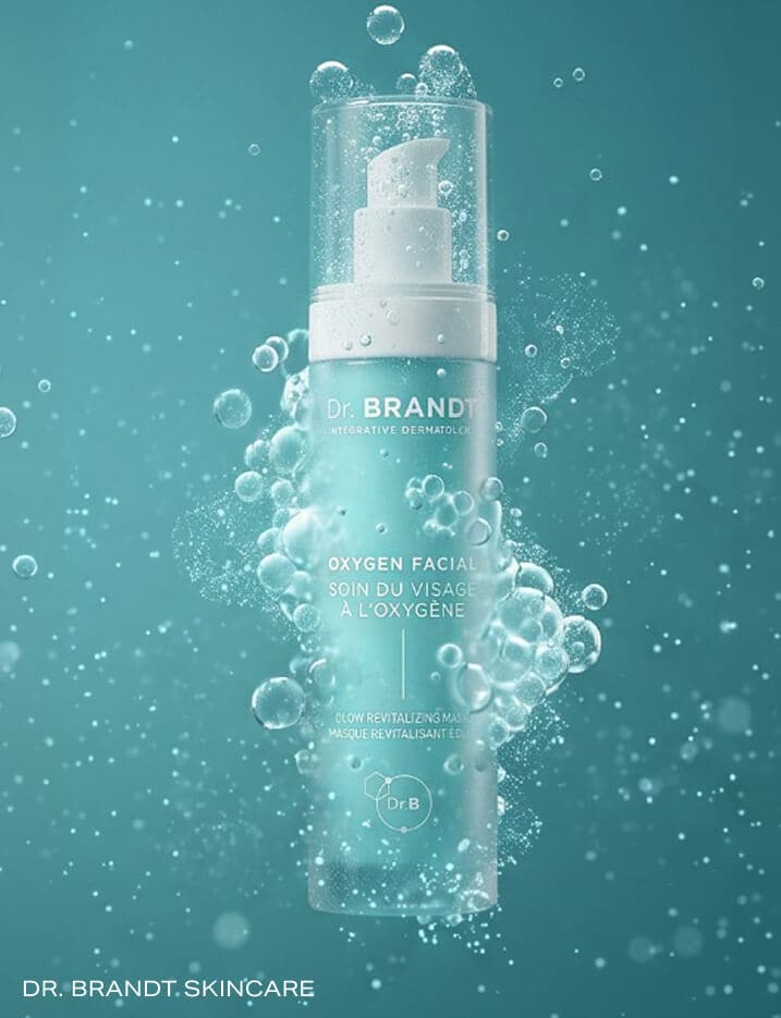 A bottle of Dr. Brandt Skincare underwater.