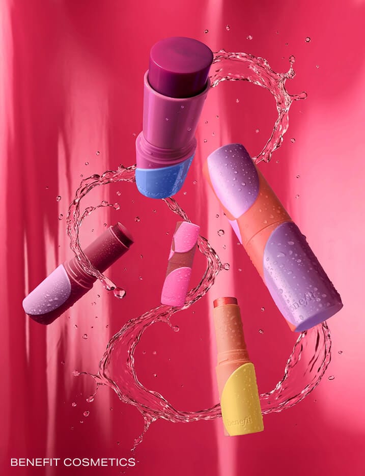 Variety of Benefit Cosmetics lip products.