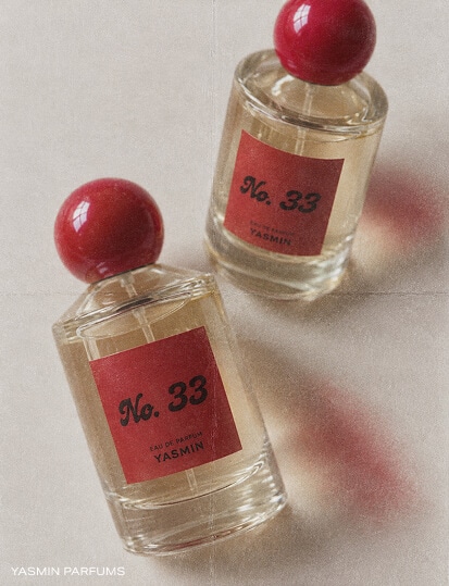 Bottles of No. 33 eau de parfum Yasmin by Yasmin Parfums.