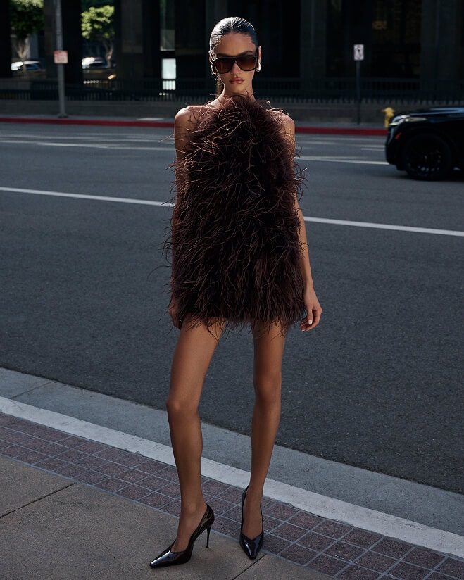 DRESSES OF THE SEASON. A cocoa brown feather mini? Yes, please.