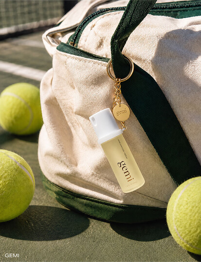 A keychain of Gemi hand sanitizer + serum. 